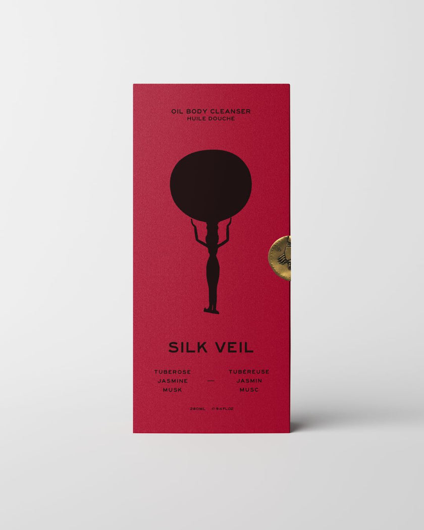 Red box with black silhouette design and 'Silk Veil' branding on a white background
