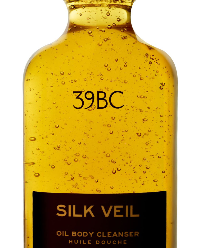 Bottle of 39BC Silk Veil Oil Body Cleanser with visible label on a white background
